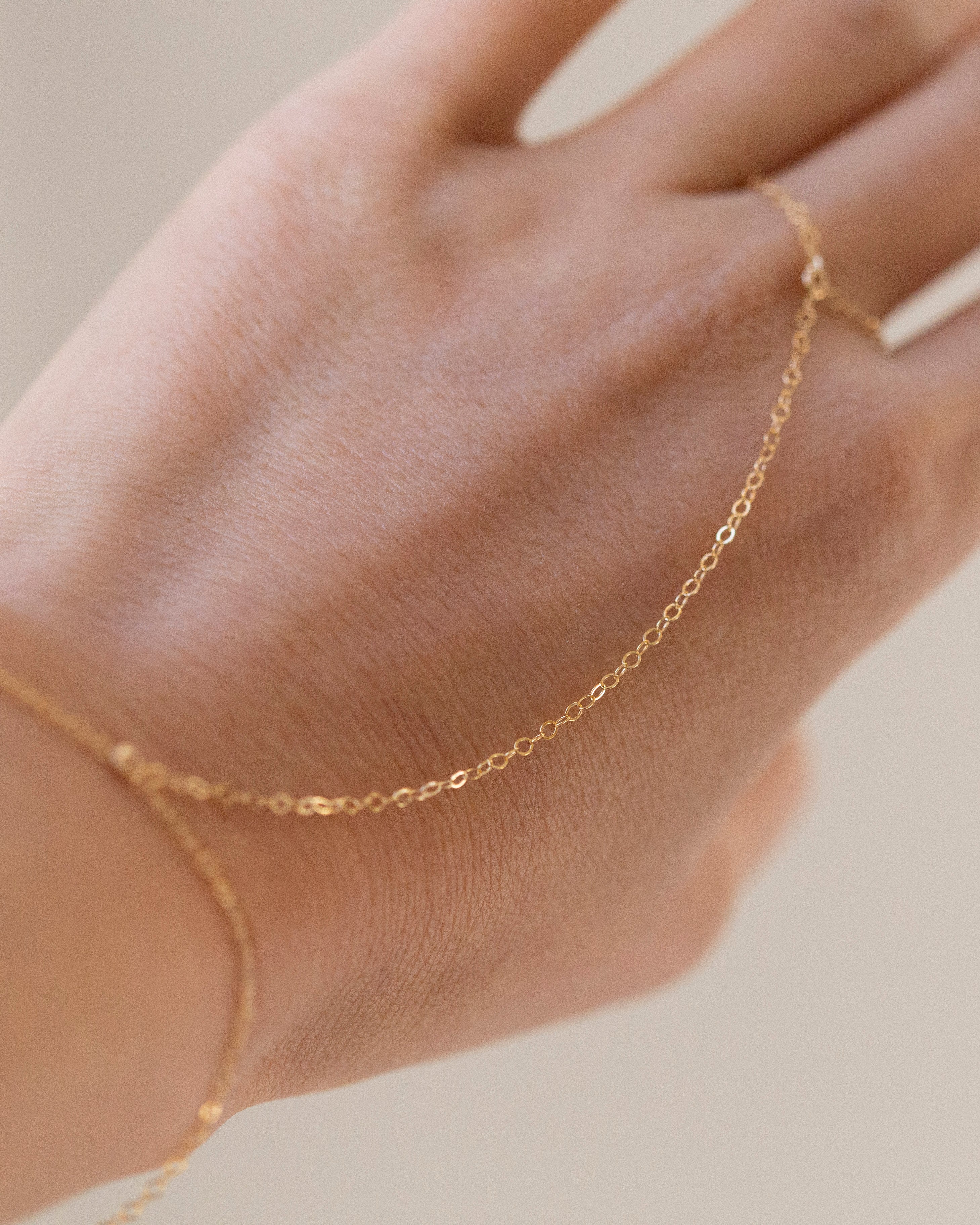 14k Gold Simple Hand Chain Bracelet - Image 2
