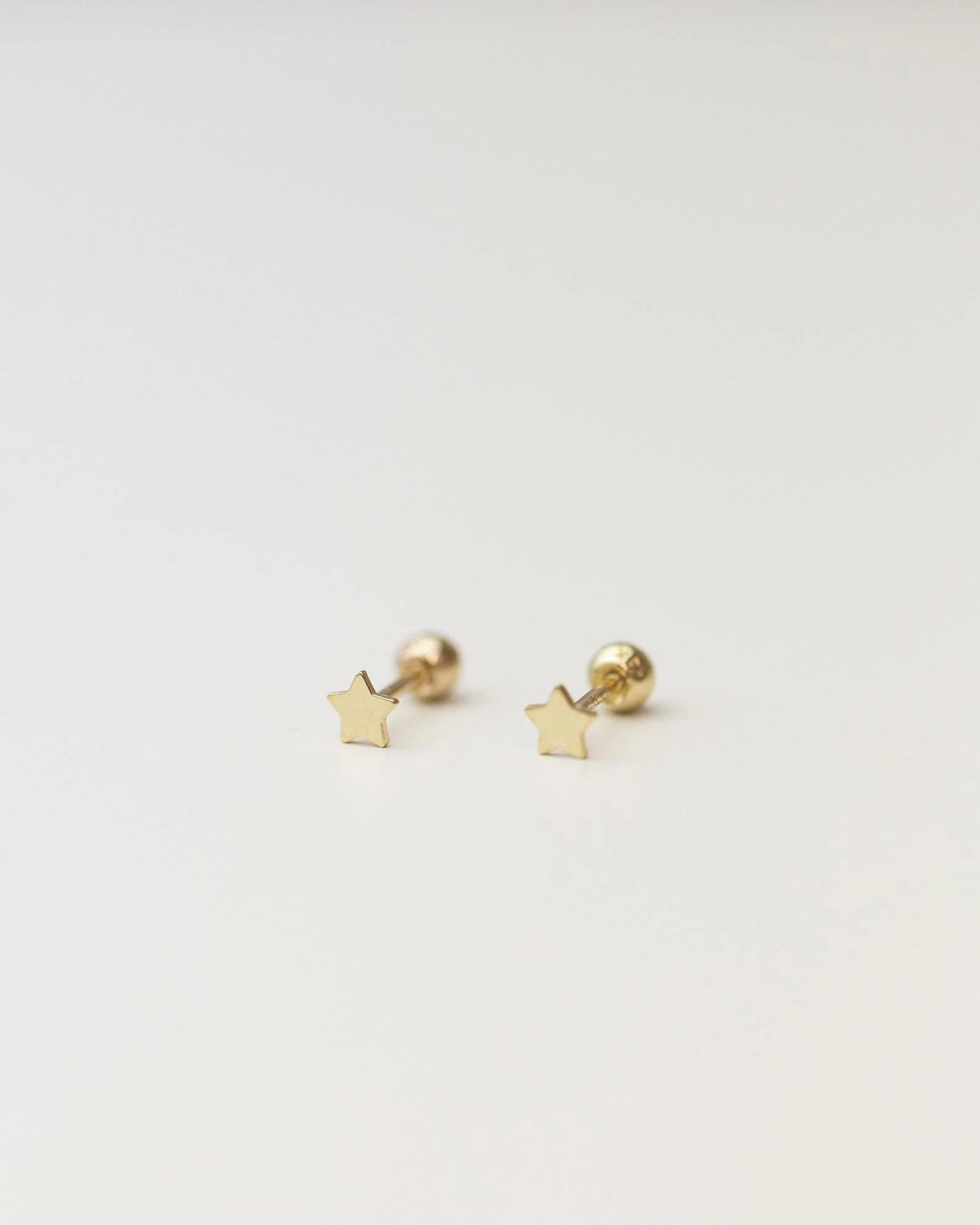 14k Mini star stud with ball screw backing - Image 2